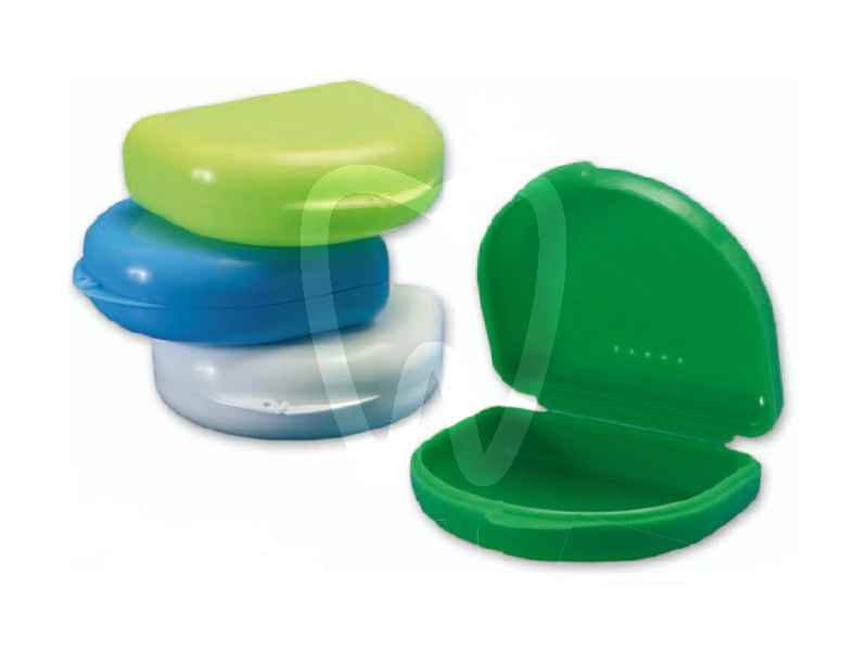 Bite holder with external clip, assorted colors. boxes larident